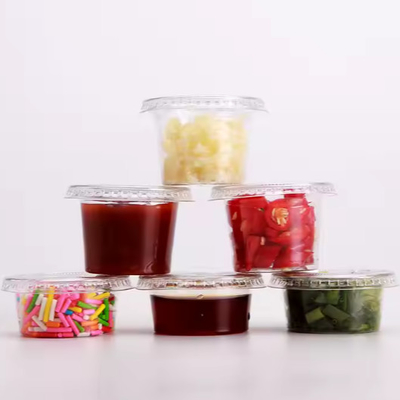 kopen Composteerbare PLA wegwerp 2 oz sausbekers met deksels heldere kleur online manufacture